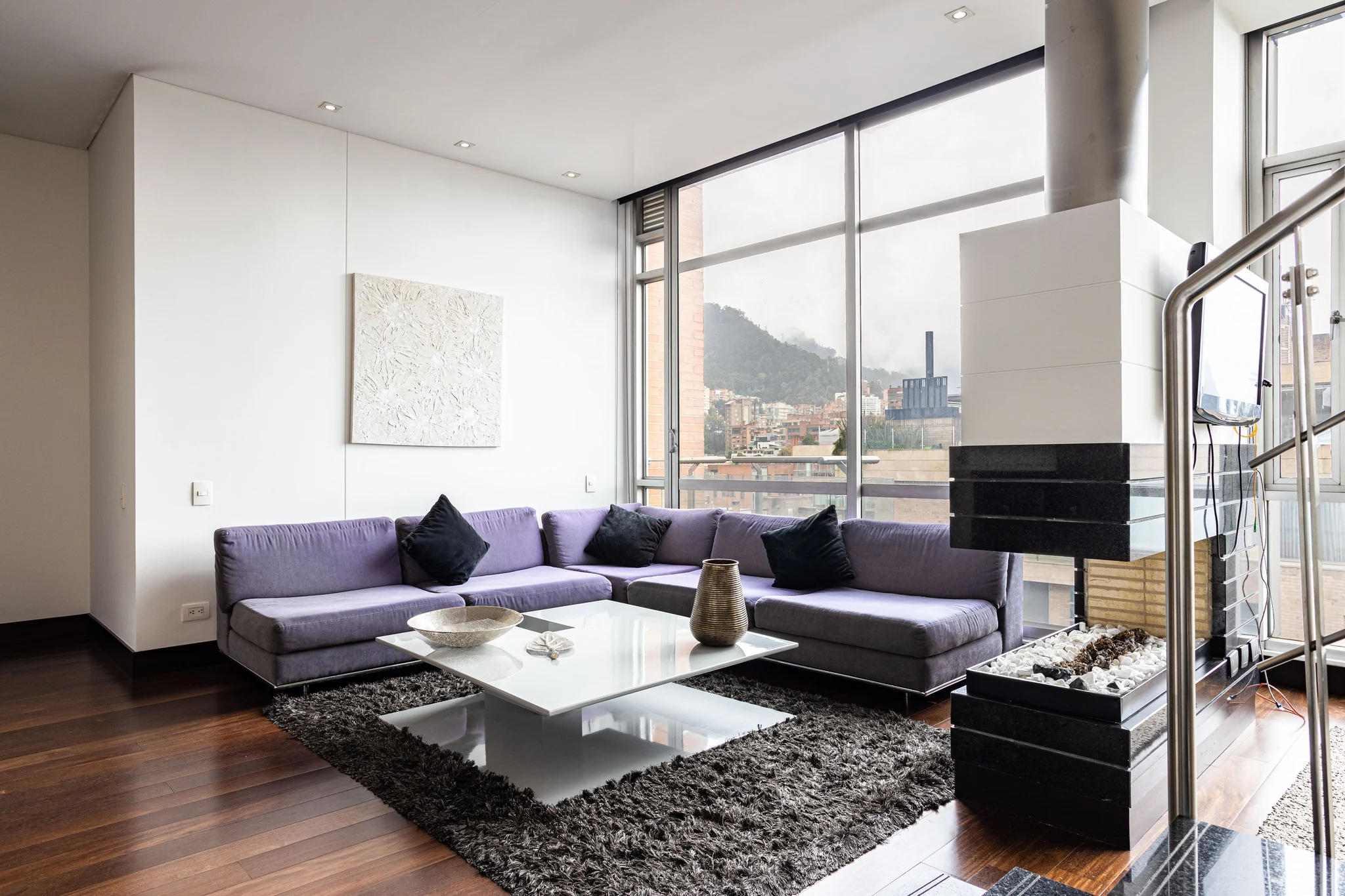 Bright, tidy living room prepared for everyday comfort.